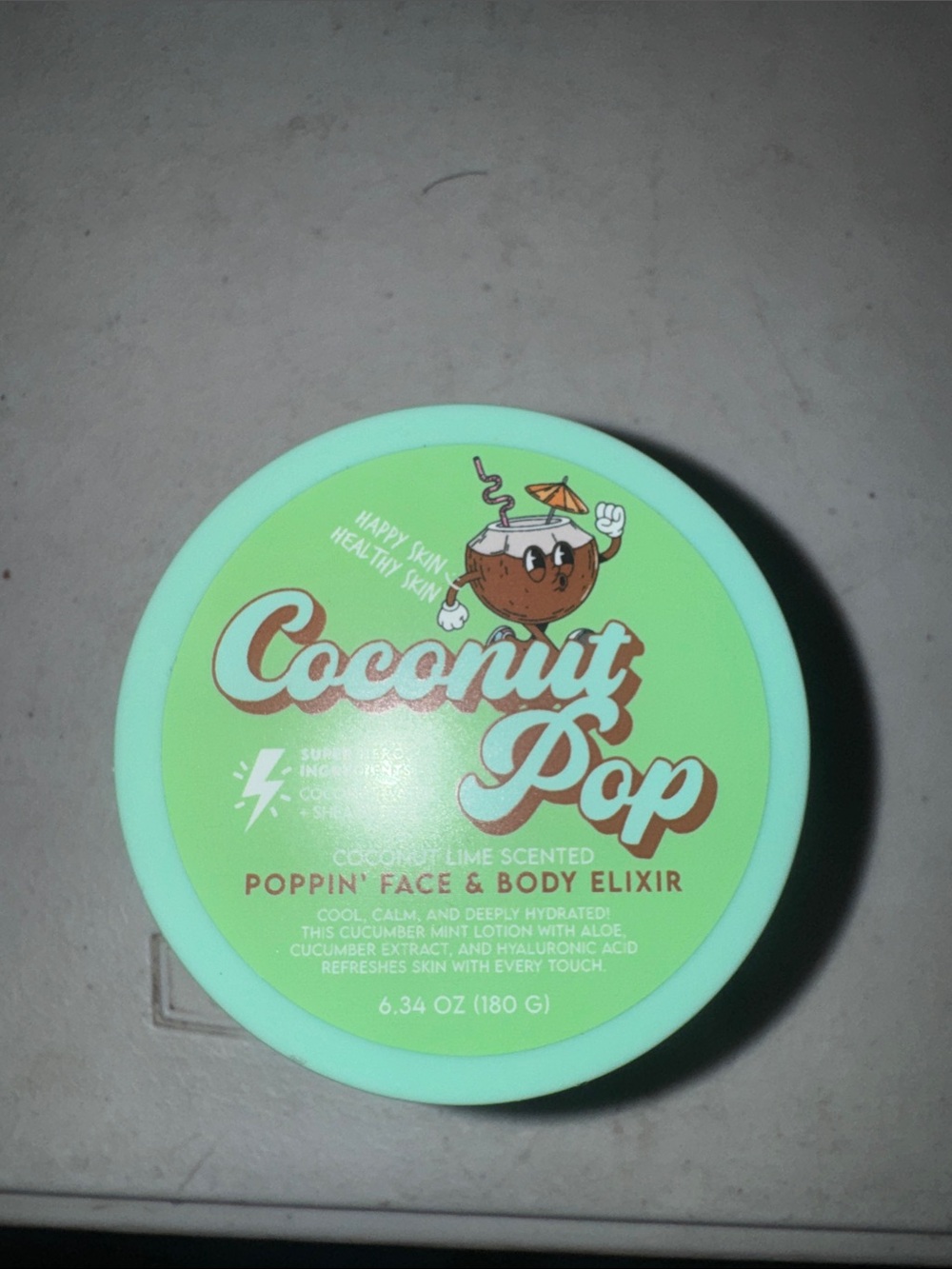 Splash Coconut Pop Poppin' Face & Body Elixir - Mint Green and Brown